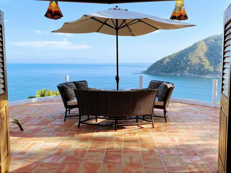 Terrace dining under the umbrella, Casa Gratitud, Yelapa